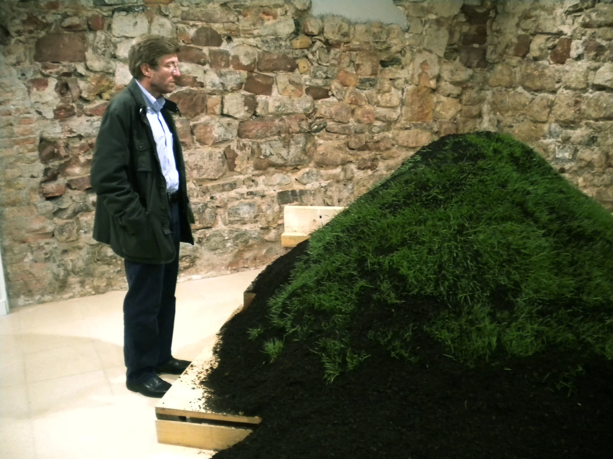 7. The artist’s father observing the installation